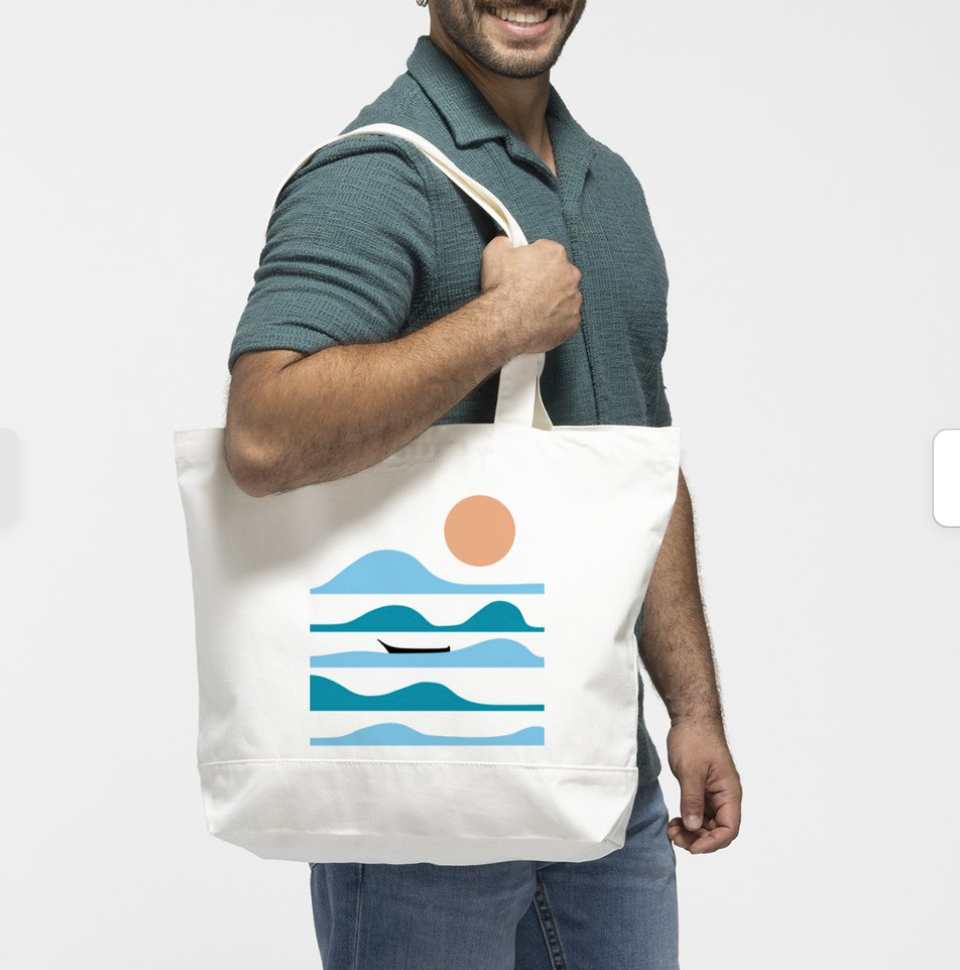 Canoe on water tote bag